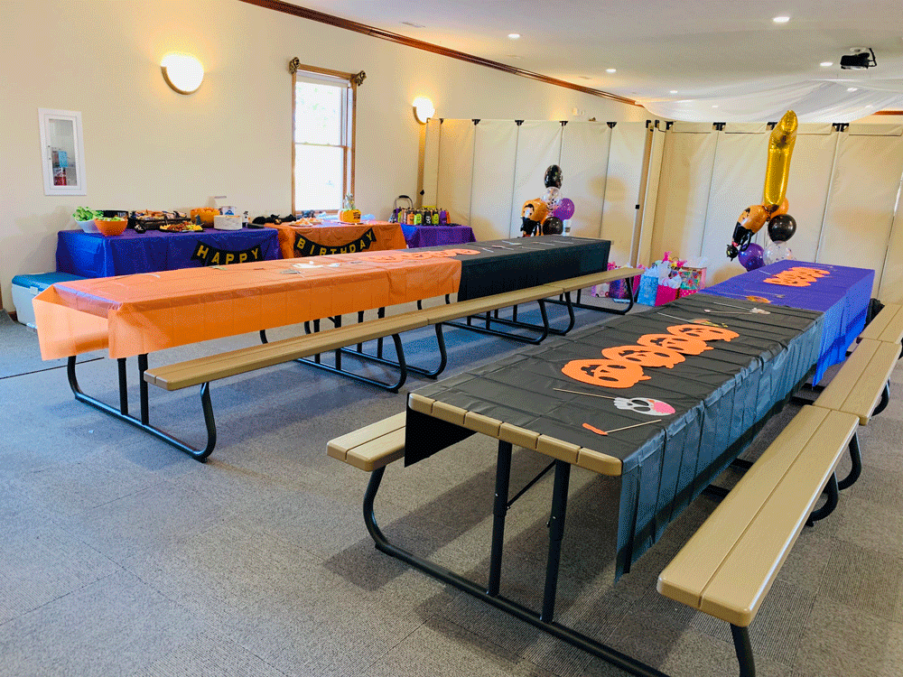 Tables set in Birthday Party Area