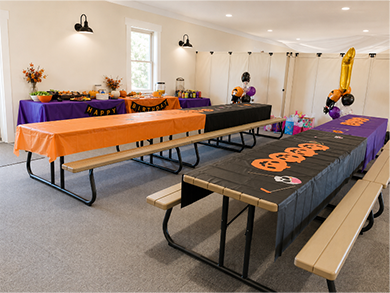 Tables set in Birthday Party Area
